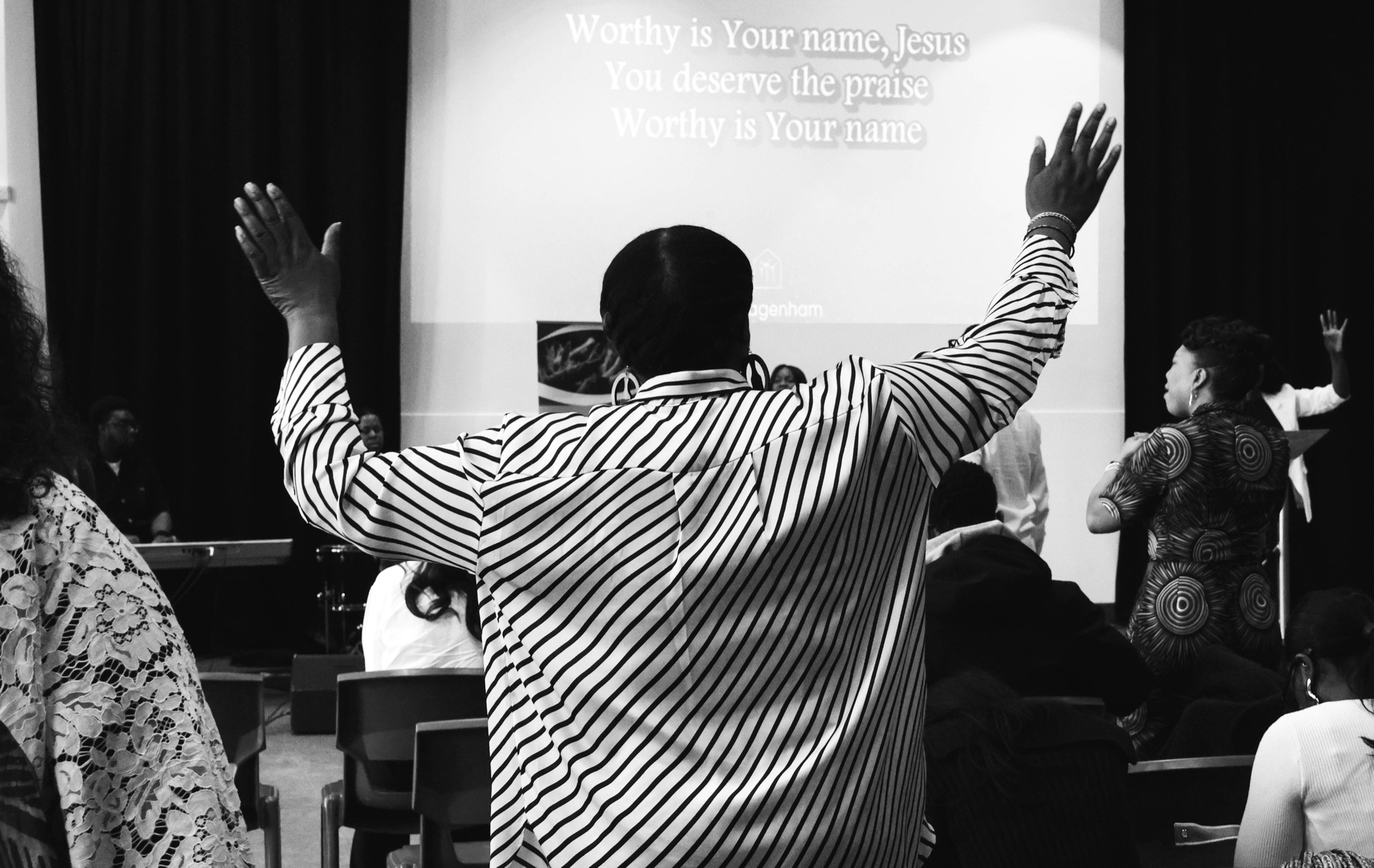 People worshipping at a church service