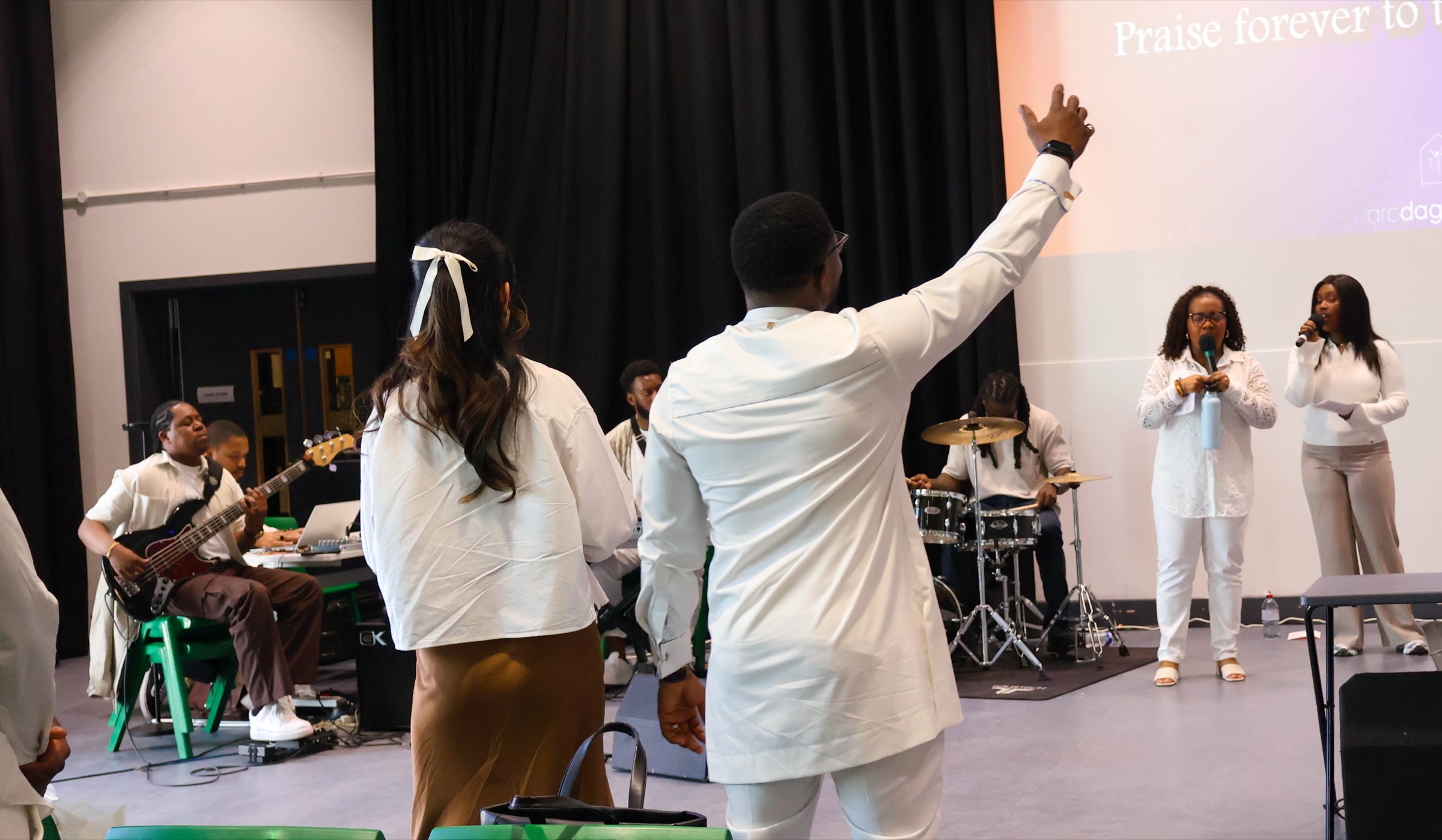 People worshipping at a church service