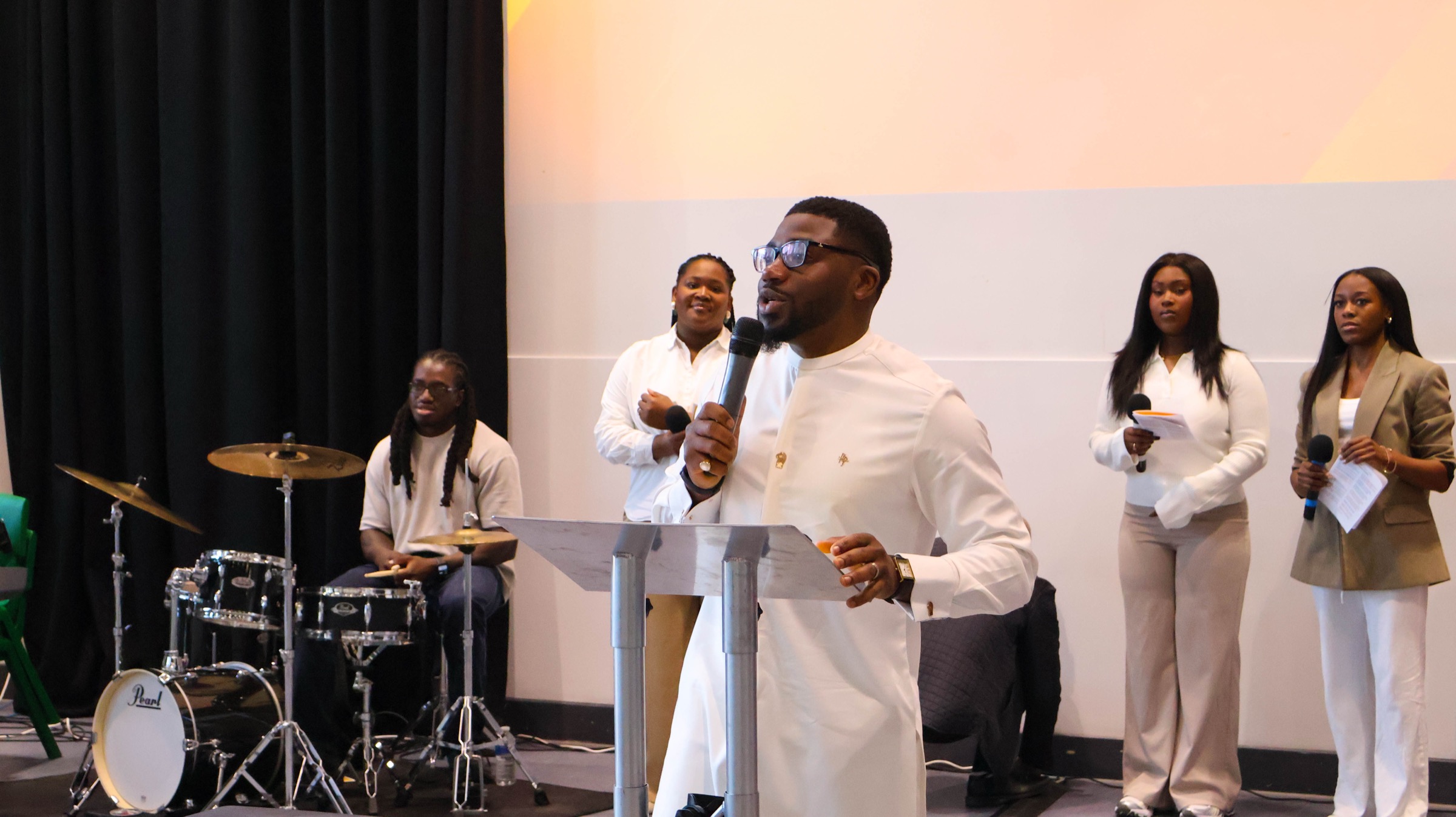 People worshipping at a church service