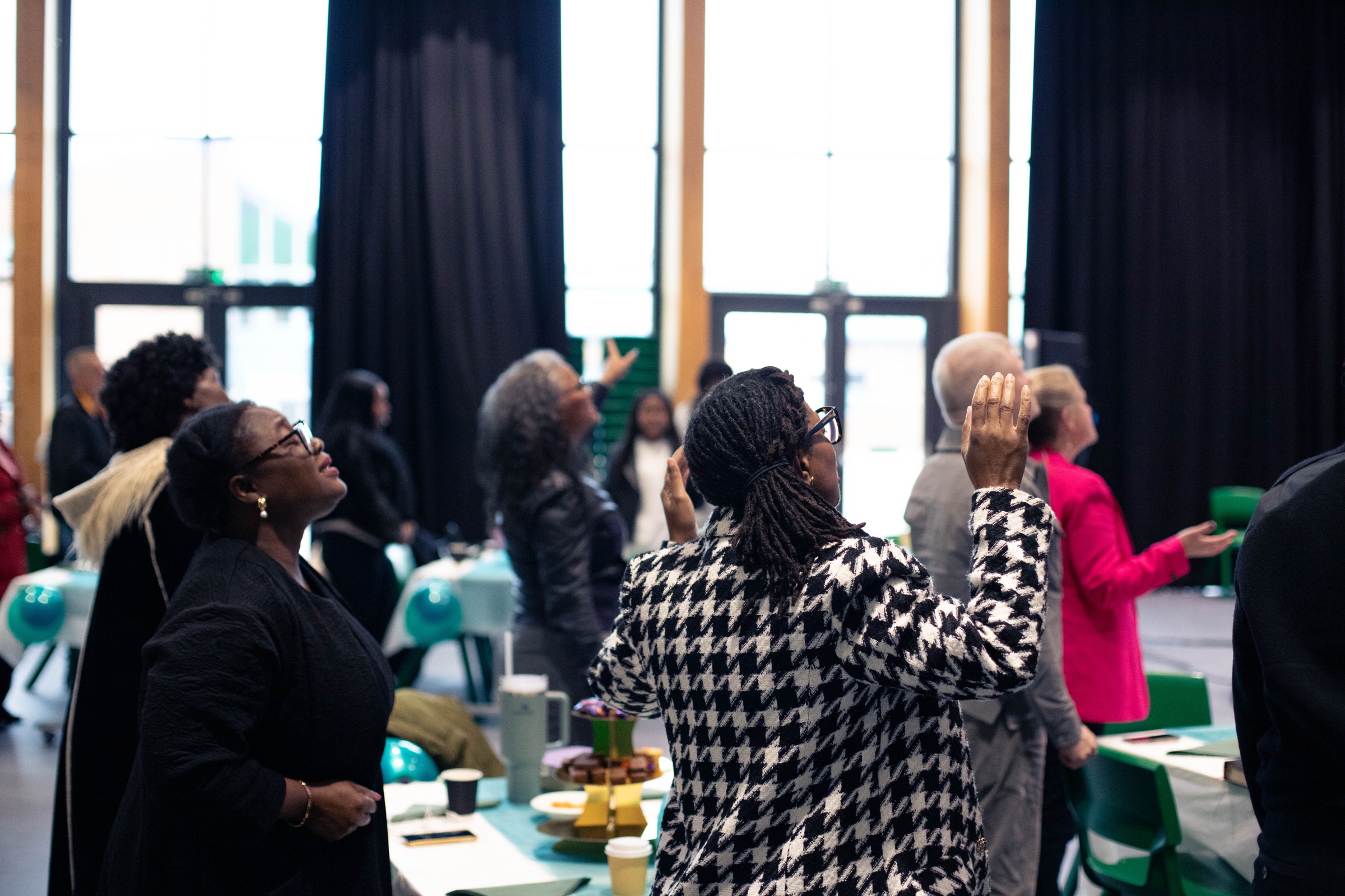 People worshipping at a church service