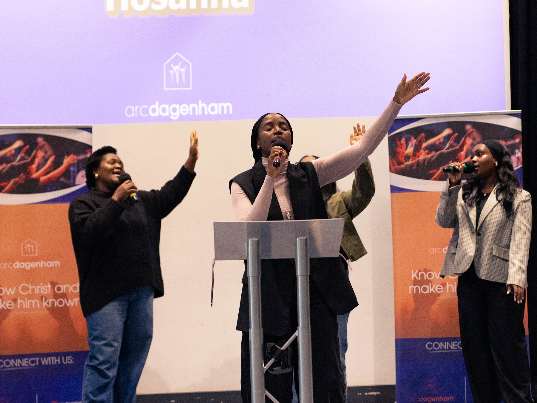 People worshipping at a church service